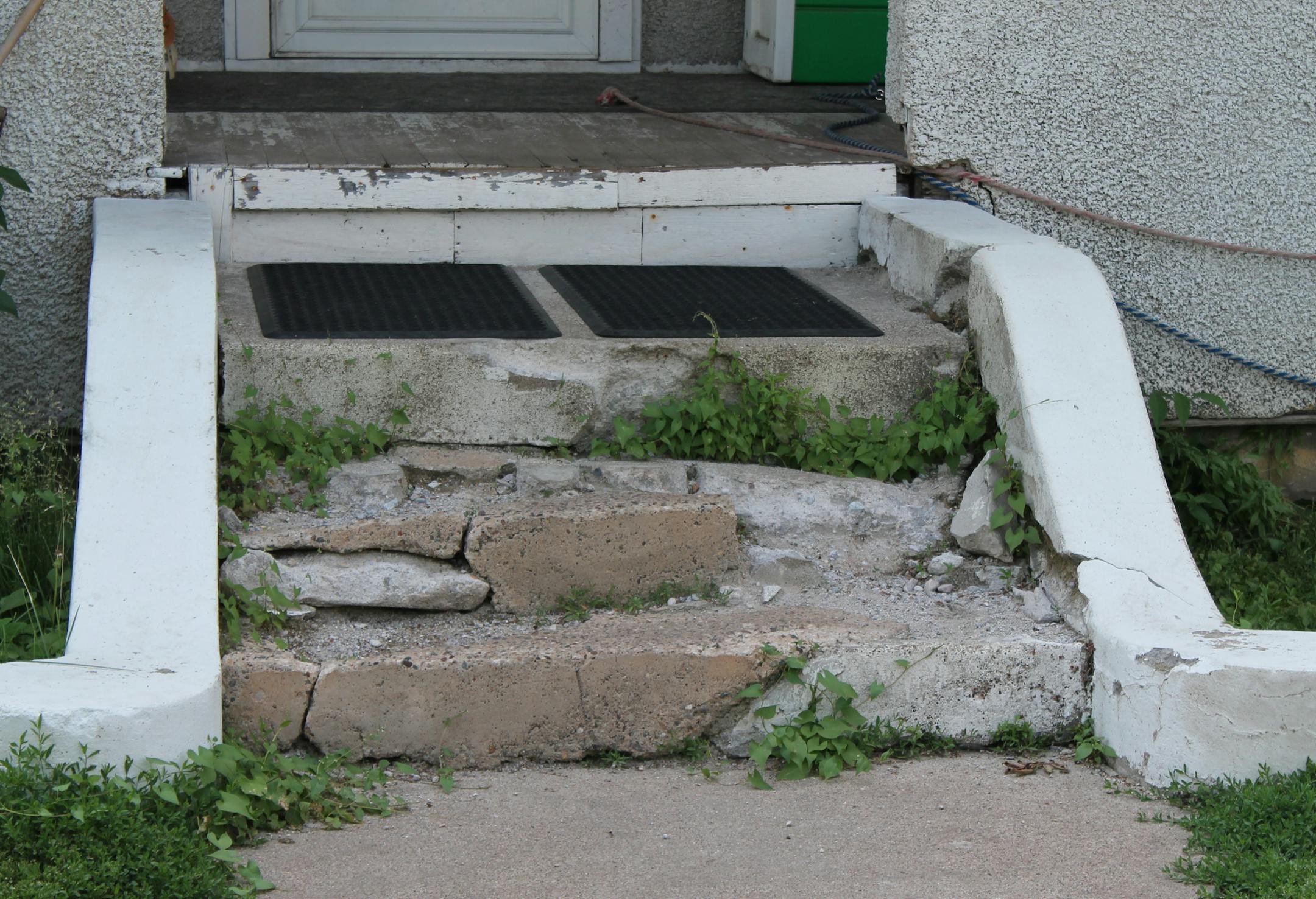 The front steps on a house on Fourth Street in Farmington have fallen apart and crumbled. An ordinance is in the works to address the exterior look of properties.