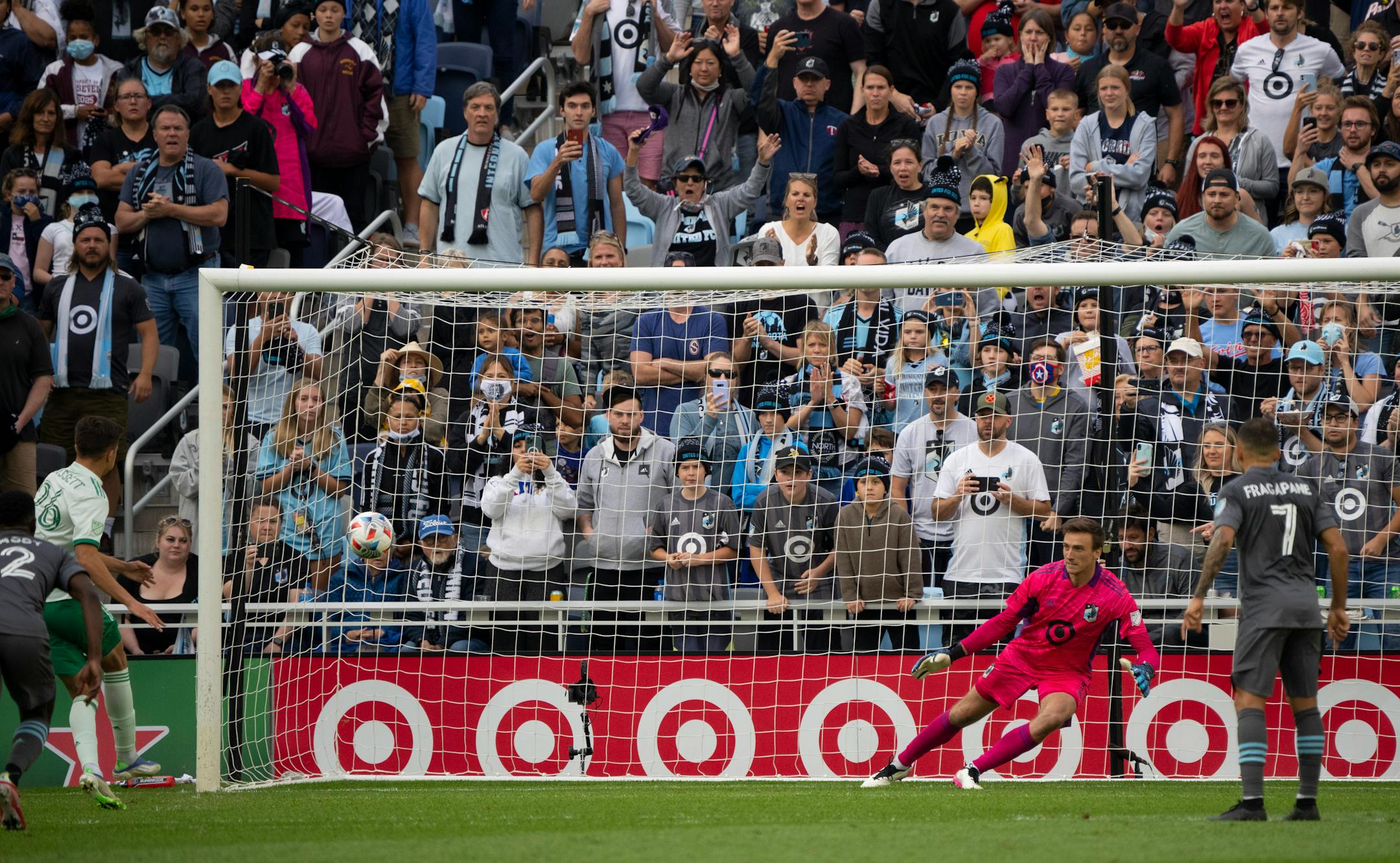 Minnesota United goalkeeper Tyler Miller moves to his left as Colorado Rapids midfielder Cole Bassett's second-half penalty shot tied the match.