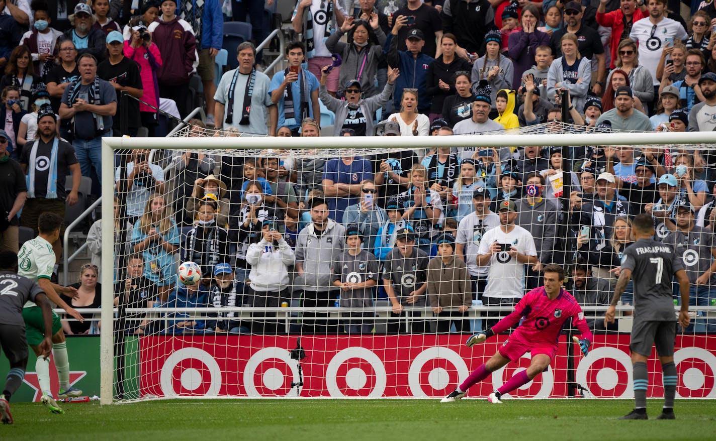 Minnesota United goalkeeper Tyler Miller moves to his left as Colorado Rapids midfielder Cole Bassett's second-half penalty shot tied the match.