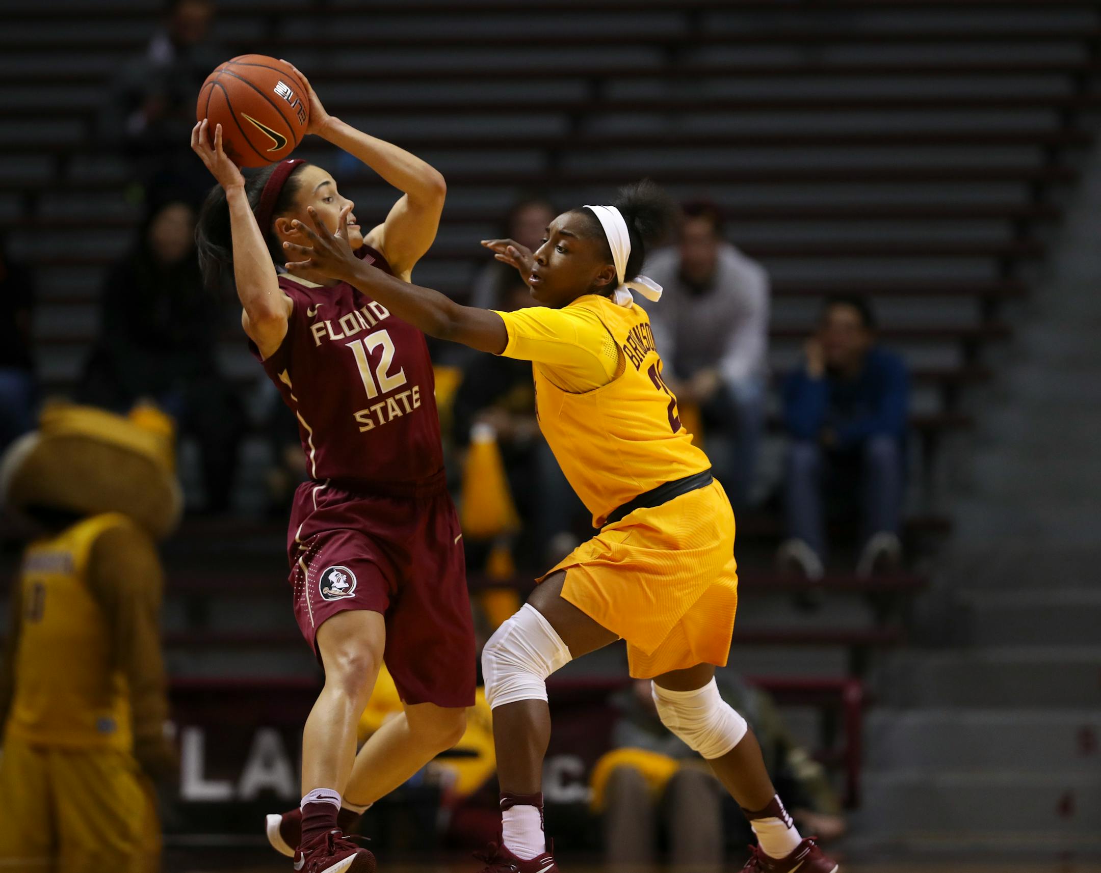 Gophers guard Jasmine Brunson (21) defended Seminoles guard Brittany Brown (12) late in the fourth quarter.