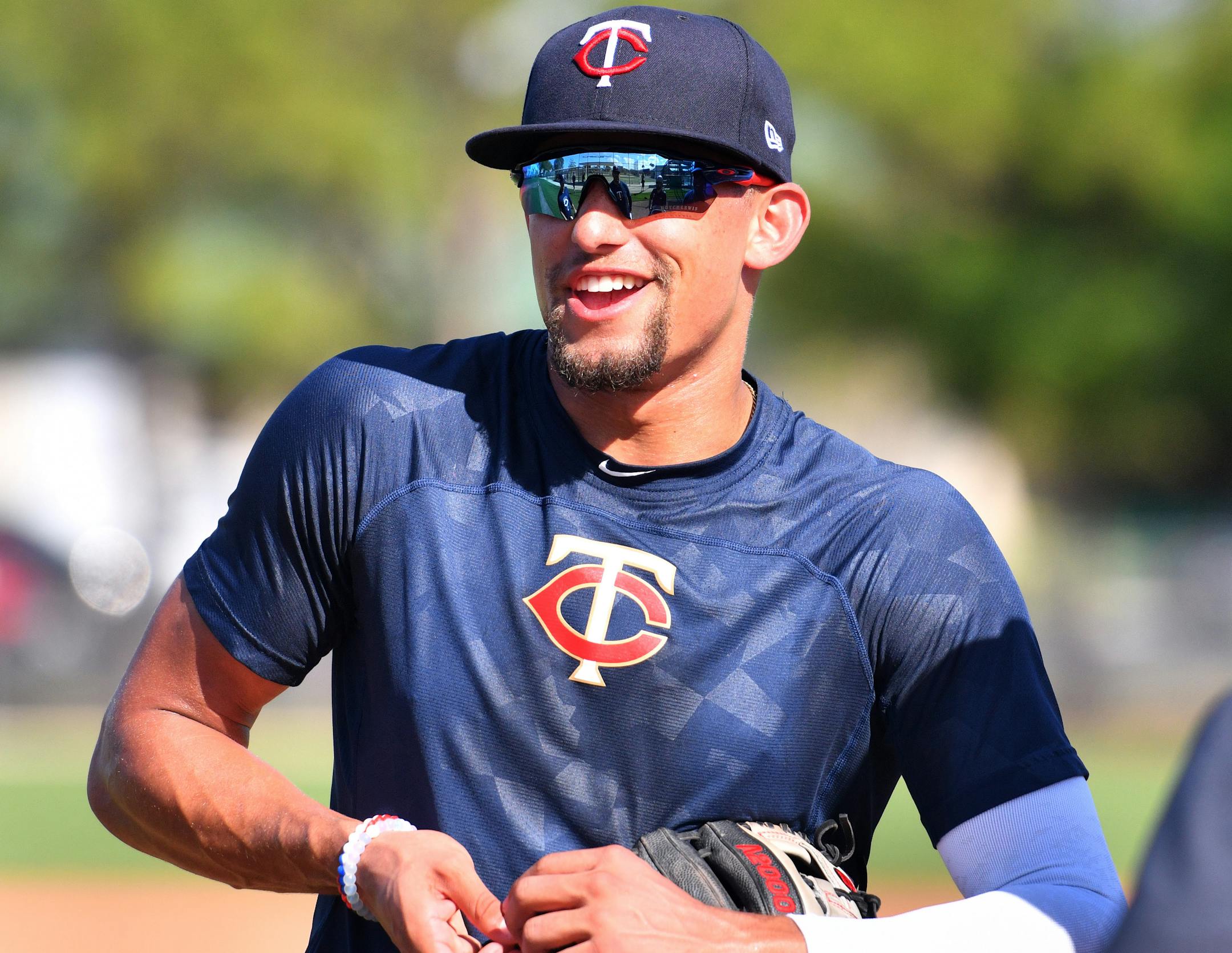 Twins minor league prospect Royce Lewis warmed up on a practice field.