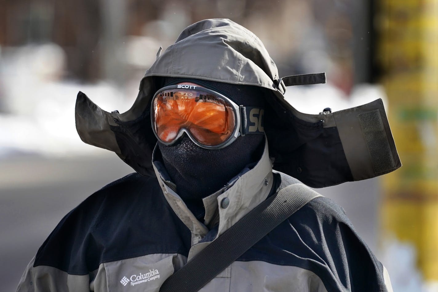 Chris Zabinski, a catering chef at the University of Minnesota, wore ski goggles and a face mask in addition to his coat as he walked to catch a bus Tuesday.