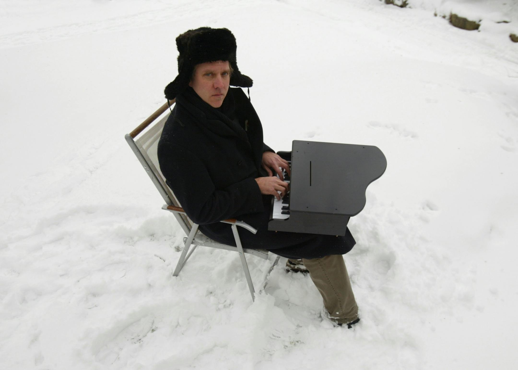 Chan Poling, tickling the ivories at home in south Minneapolis Monday afternoon.