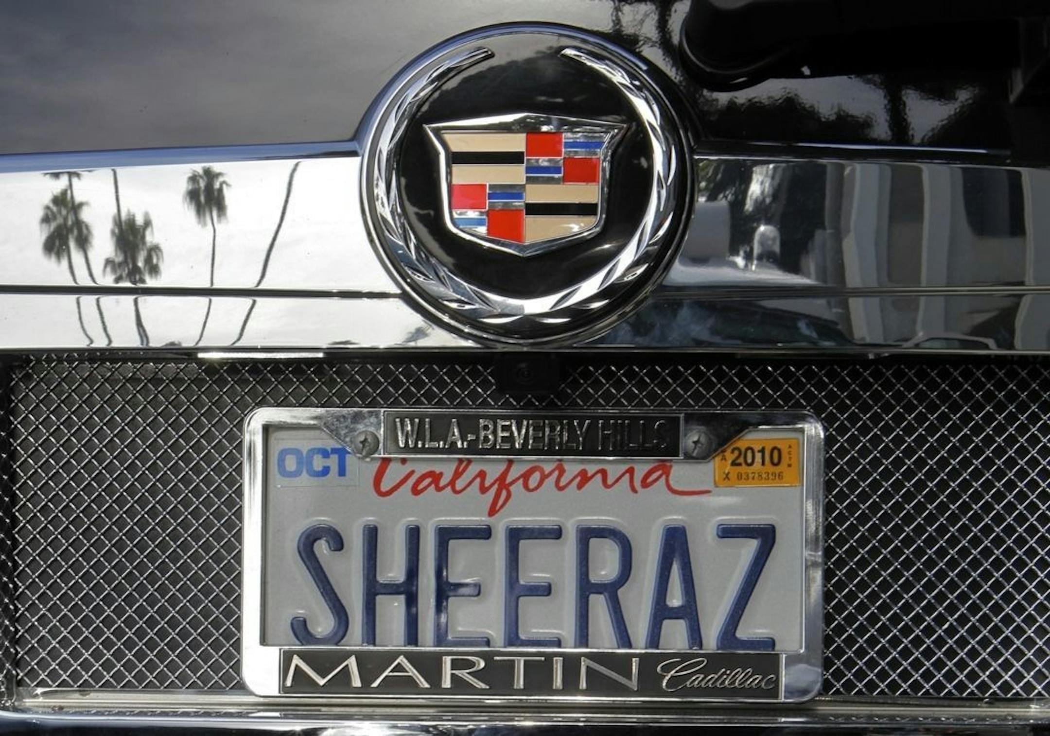 An SUV with a personalized license plate in Beverly Hills, Calif.