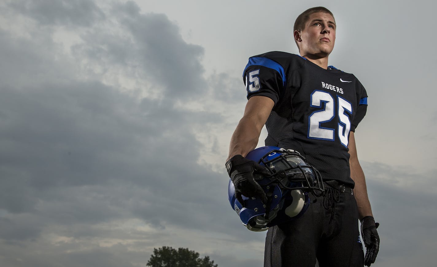 Gunnar Bloom, Rogers High School ] CARLOS GONZALEZ cgonzalez@startribune.com - August 17, 2014 , Roseville, Minn, Profiles of five kids, each from a different and major conference, for prep football section. High School Football, Gunnar Bloom, Rogers Josh Corcoran, Lakeville Will Rains, Eden Prairie Jesper Horsted, Roseville Adam Buirge Park Center