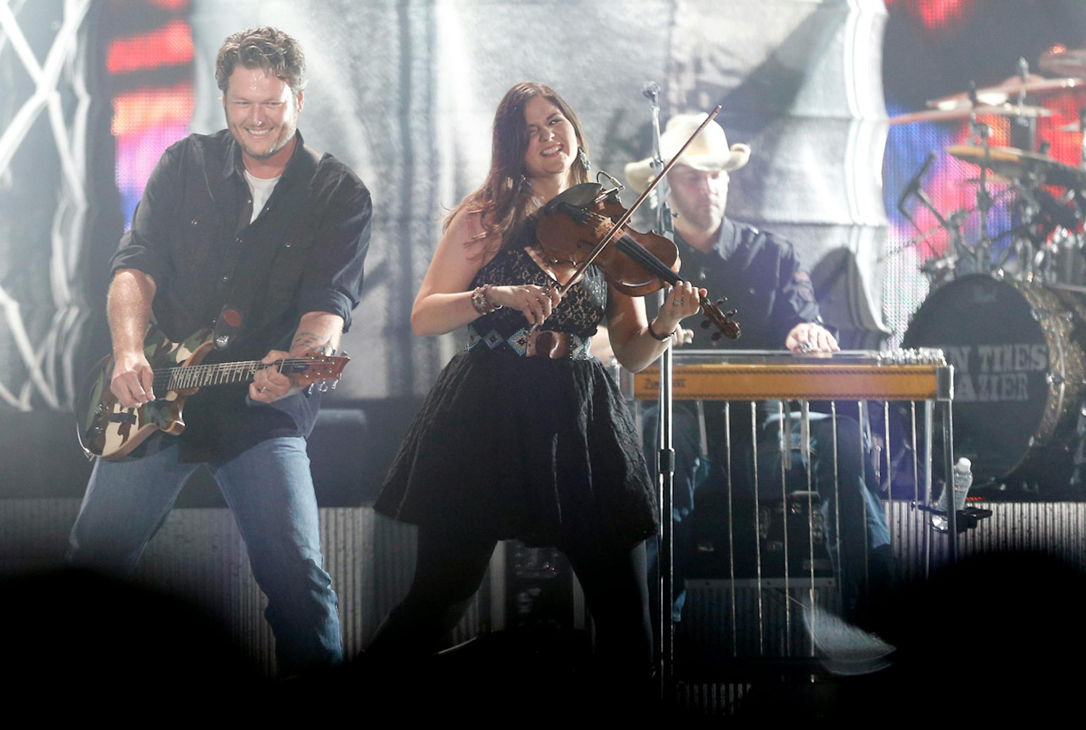 Country star Blake Shelton rocked out at the Xcel Energy Center with fiddler Jenee Fleenor. For a set list, go to www.startribune.com/artcetera.