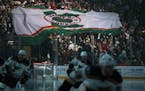 Fans at Xcel Energy Center passed around the State of Hockey flag during last season's playoffs.