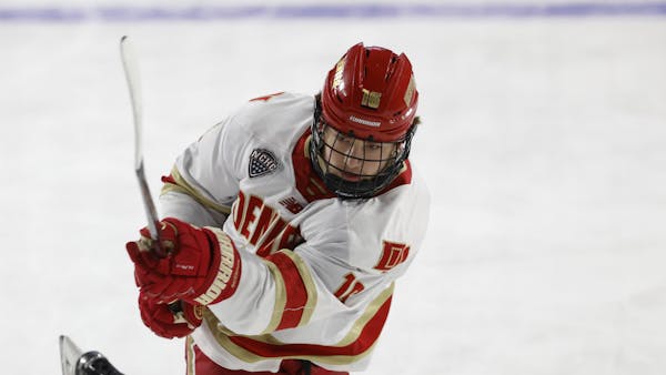 Denver forward Tristan Broz (16) transferred from the Gophers and has been a top-line center for the Pioneers.