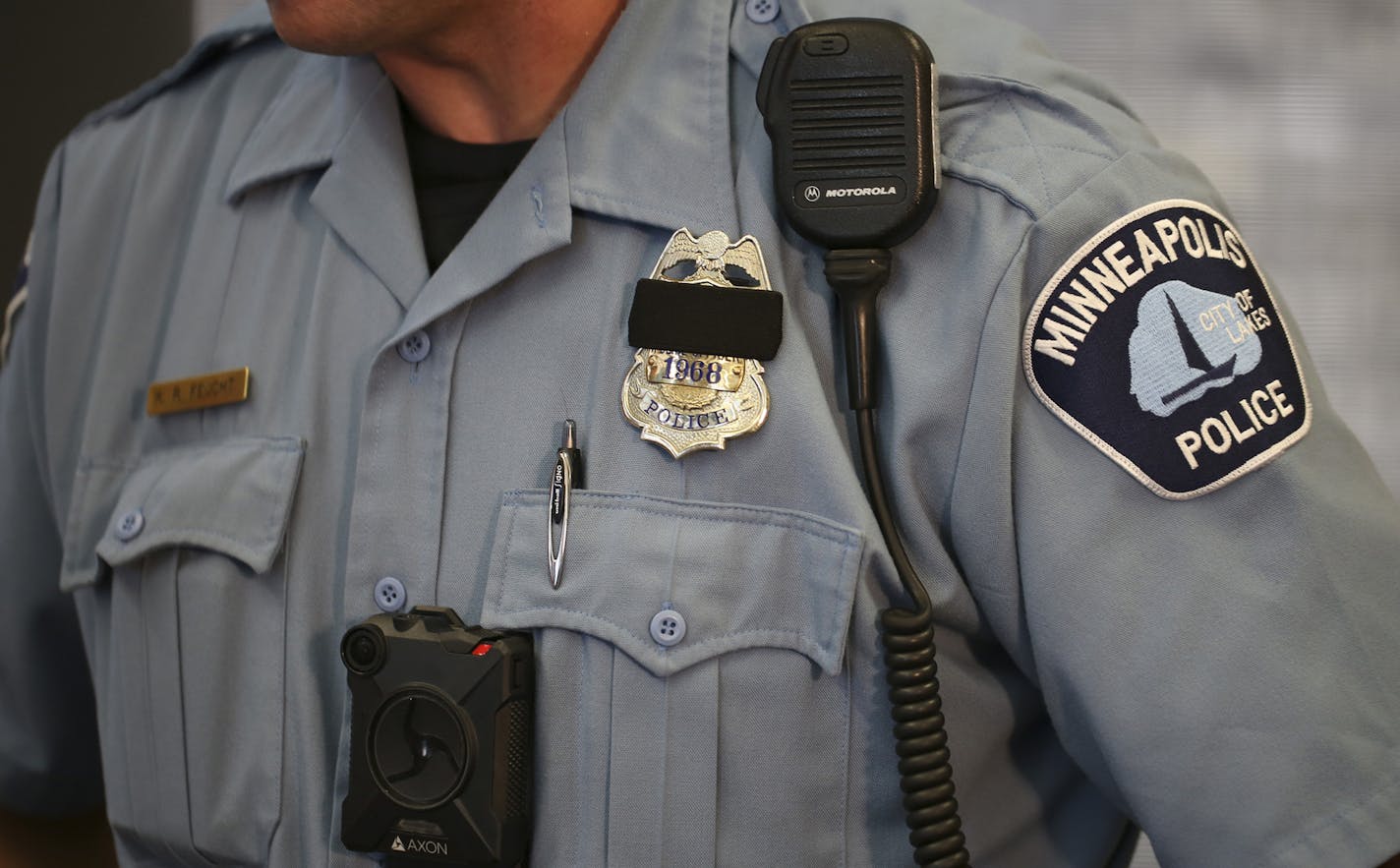 Minneapolis Police Officer Ken Feucht was one of the officers who volunteered for the body camera pilot program. He wore the Axon camera, made by Taser that will be used by the Minneapolis Police Department at the news conference at the First Precinct Police Headquarters Tuesday afternoon. ] JEFF WHEELER &#xef; jeff.wheeler@startribune.com Mayor Betsy Hodges and Police Chief Jane Harteau announced at a news conference Tuesday afternoon, July 19, 2016 that Minneapolis Police Department's Body Cam