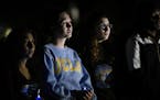 Students attended a candlelight vigil for Prof. William Klug at the University of California, Los Angeles, on Thursday night in Los Angeles. A former 