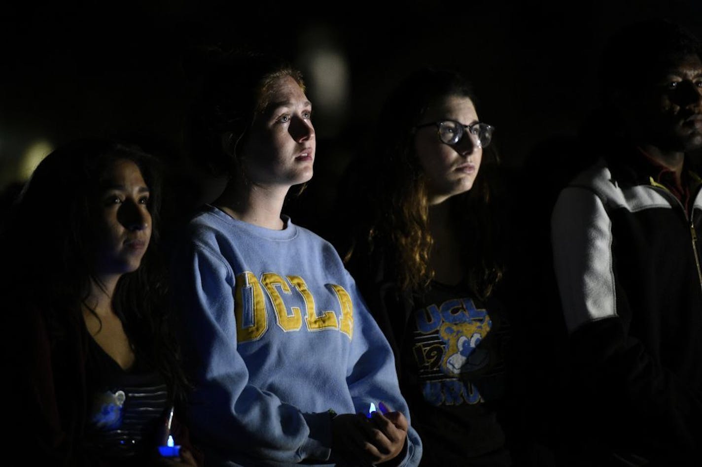 Students attended a candlelight vigil for Prof. William Klug at the University of California, Los Angeles, on Thursday night in Los Angeles. A former UCLA graduate student killed a woman in Minnesota before carrying two semi-automatic pistols and a grudge back to Los Angeles, where he fatally shot a young professor on Wednesday he once called a mentor and then killed himself, police said Thursday.