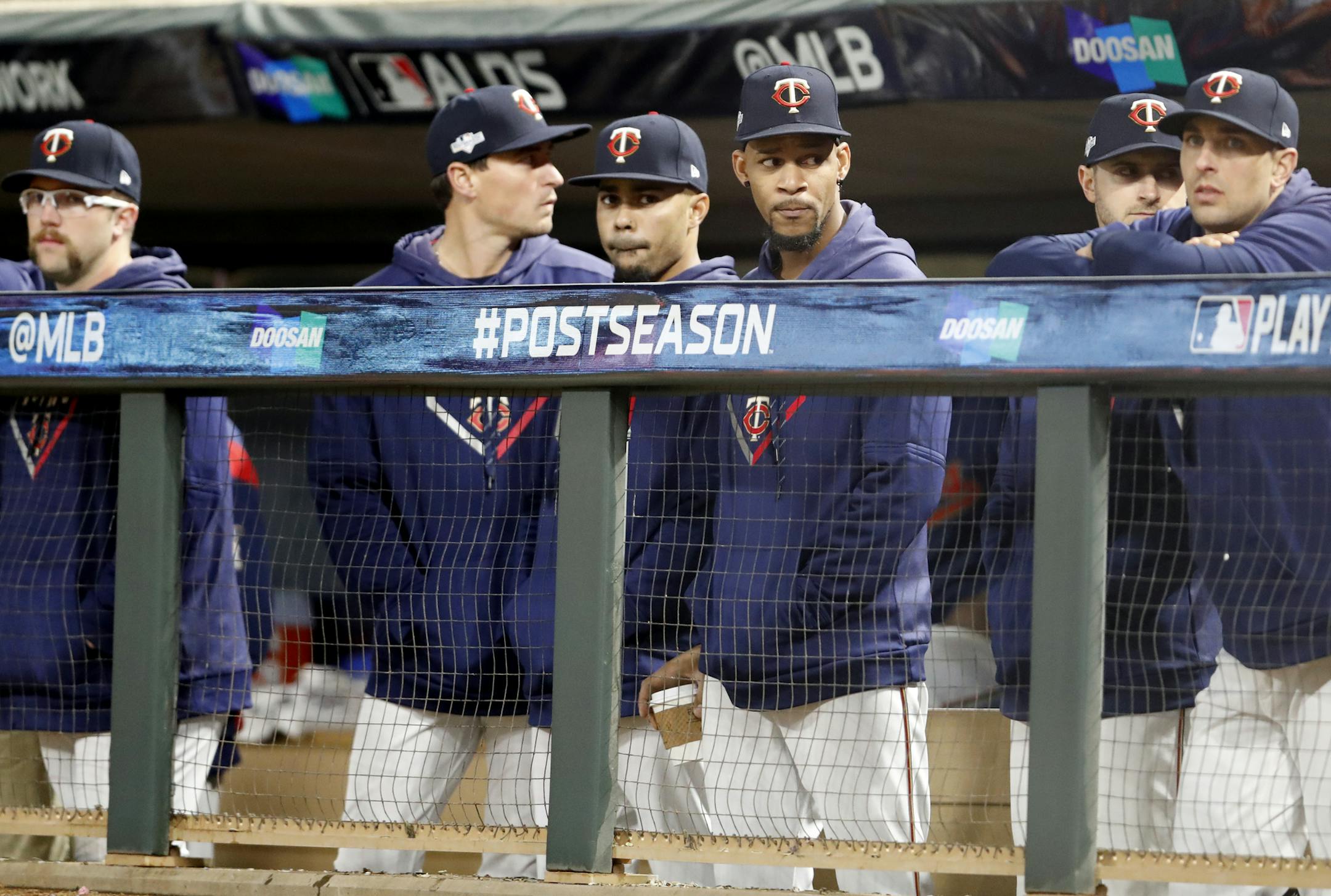 Twins players, including injured center fielder Byron Buxton (middle), wore some grim faces during the ninth inning of an ALDS Game 3 loss to the Yankees at Target Field that brought an end to the Twins' season.