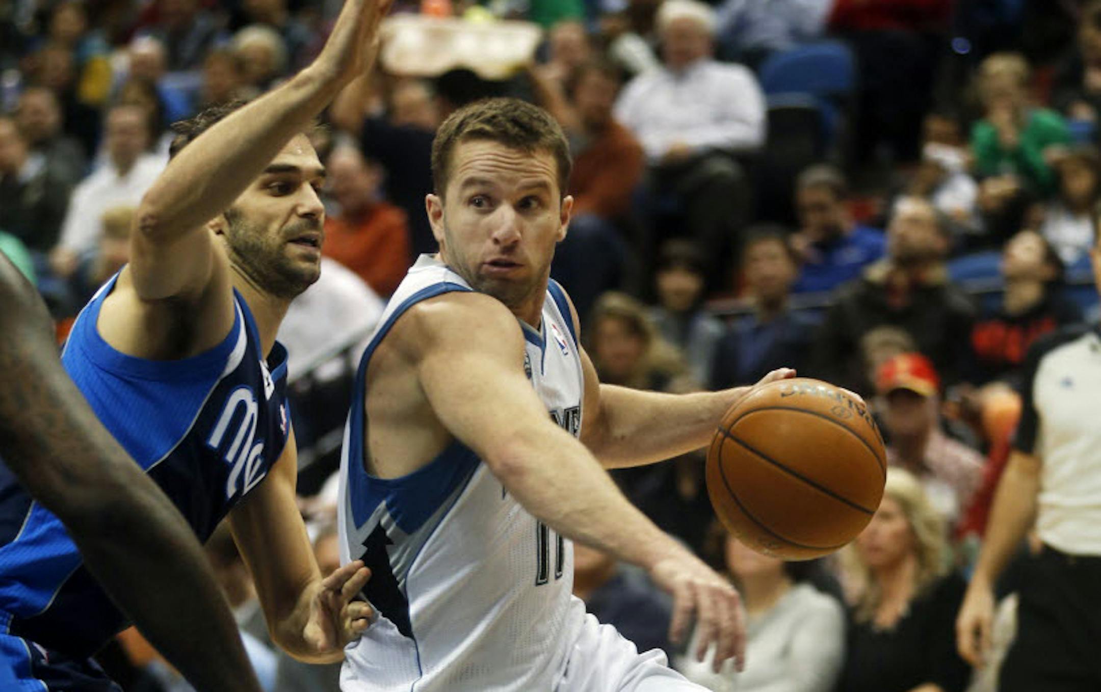 Wolves point guard J.J. Barea, right