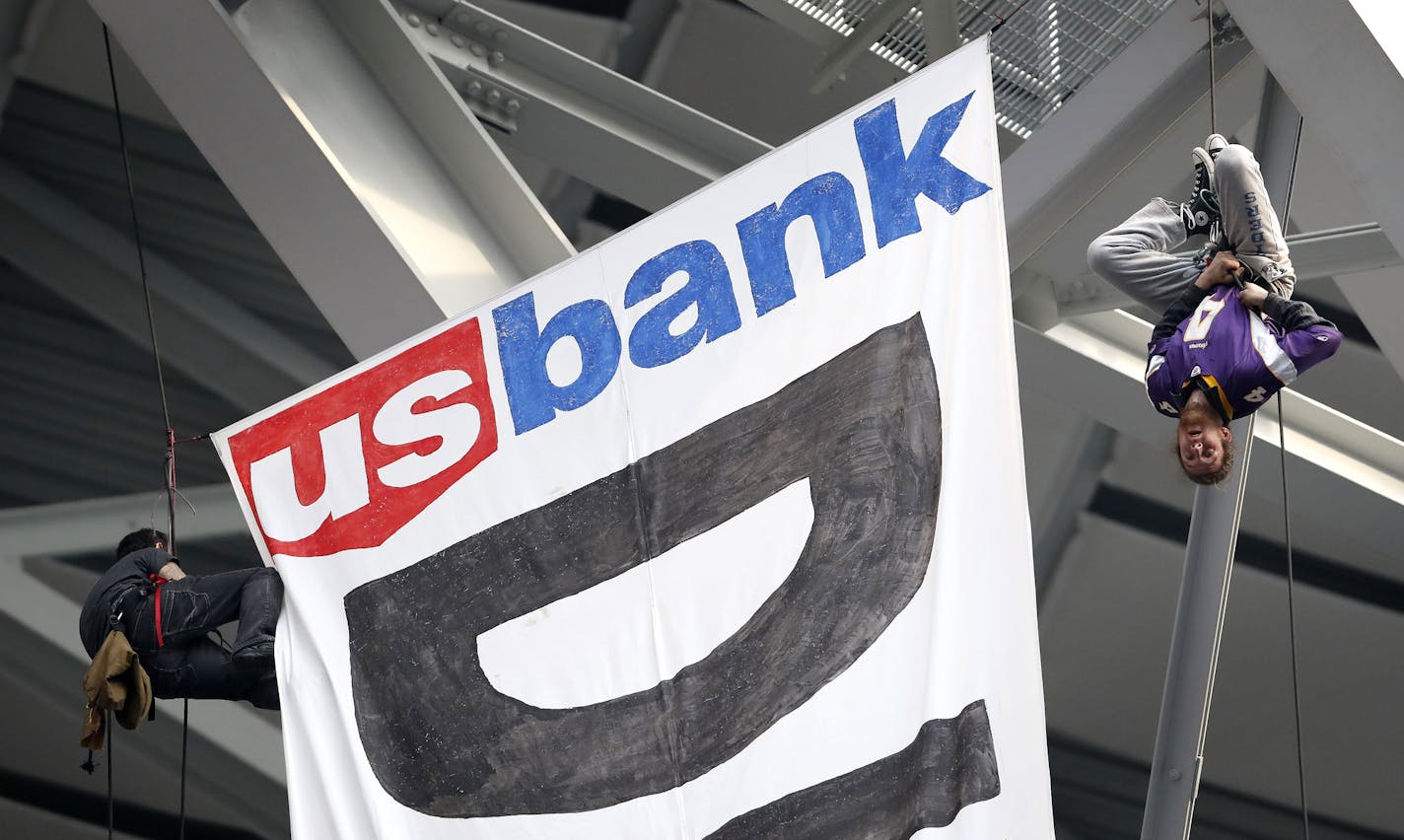 #NoDAPL protesters hung a sign from the rafters of US Bank Stadium during the Minnesota Vikings vs. Chicago Bears Game. ] CARLOS GONZALEZ cgonzalez@startribune.com - January 1, 2017, Minneapolis, MN, US Bank Stadium, NFL, Minnesota Vikings vs. Chicago Bears