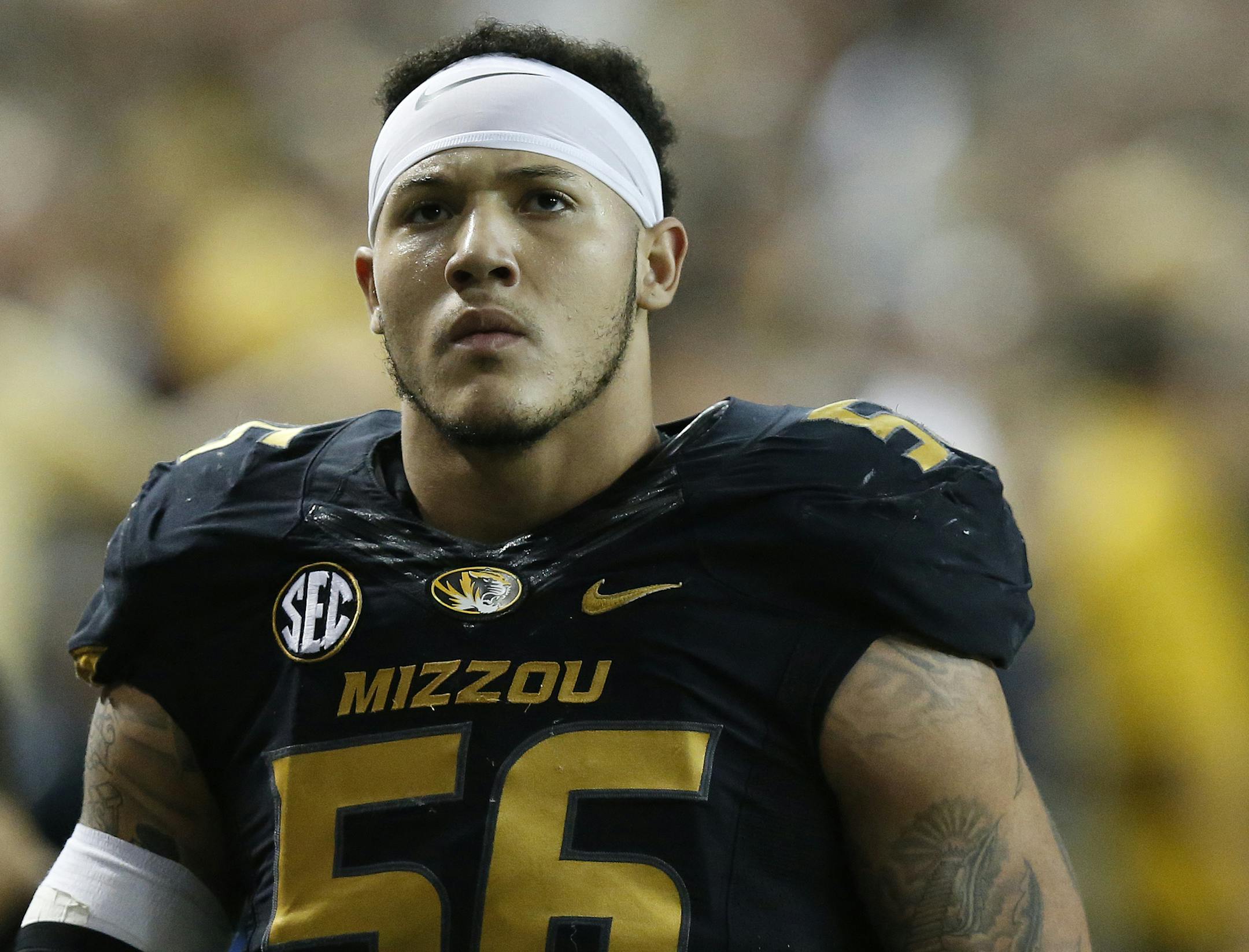 Missouri defensive lineman Shane Ray (56) walks off the field after being ejected from the game for a late hit against Alabama quarterback Blake Sims during the first half of the Southeastern Conference championship NCAA college football game, Saturday, Dec. 6, 2014, in Atlanta. (AP Photo/Brynn Anderson) ORG XMIT: GAMS144