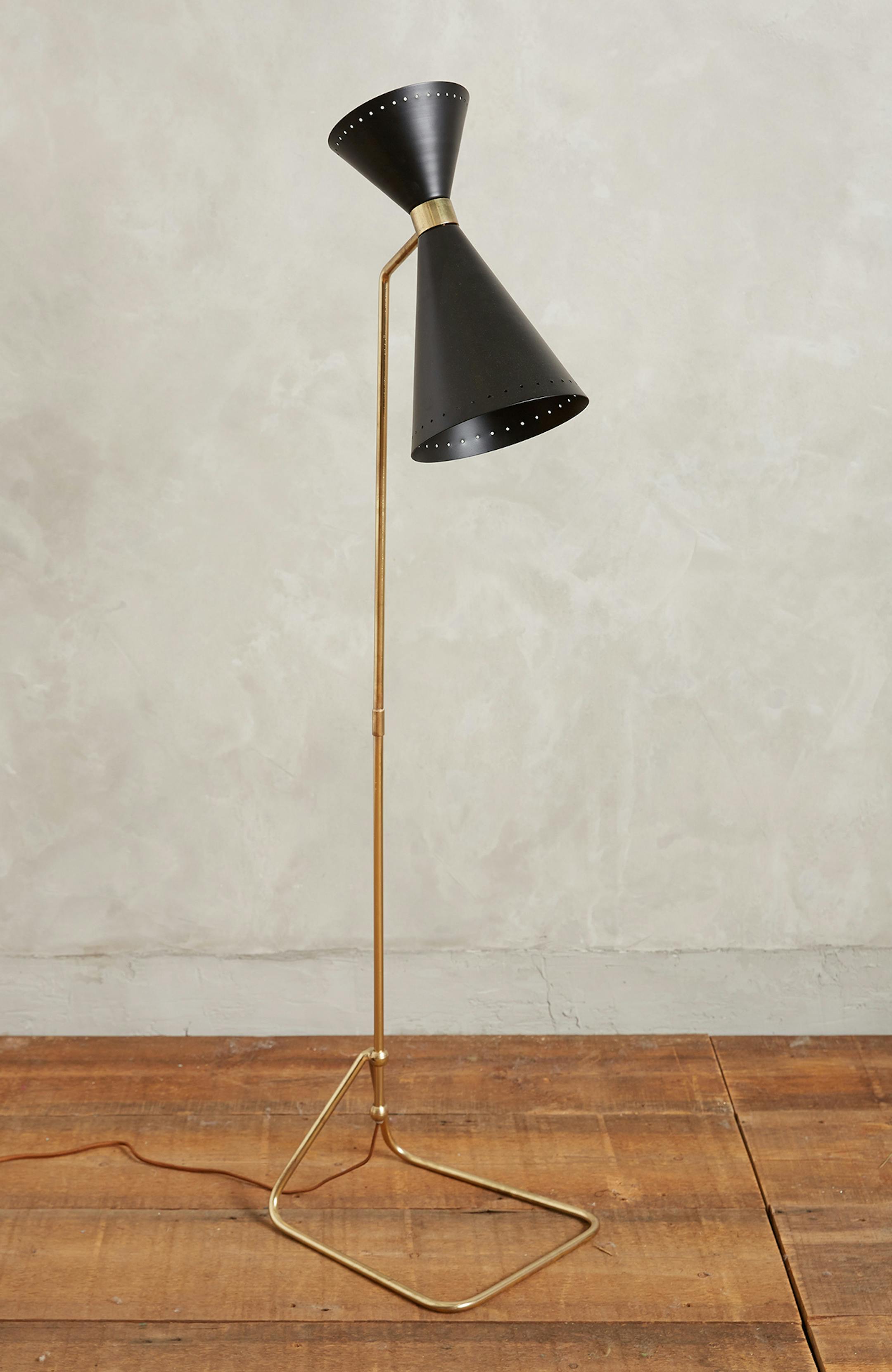 The Novara Floor Lamp, with a black, gold or green shade, would give a seating arrangement some personality ($398). Illustrates FLOORLAMPS (category l), by Lindsey M. Roberts, special to The Washington Post. Moved Wednesday, March 04, 2015. (MUST CREDIT: Anthropologie.)