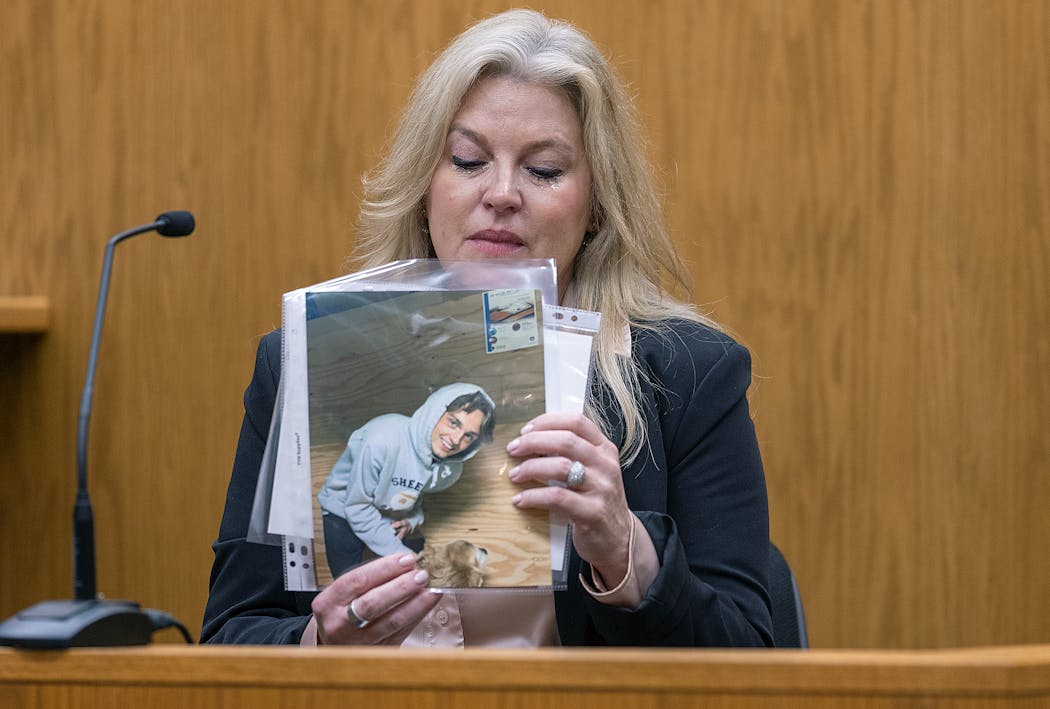 Isaac Schuman’s mother Alina Hernandez takes the stand during the second day of the trial against Nicolae Miu at the St. Croix County Circuit Court in Hudson, Wis., on Tuesday.