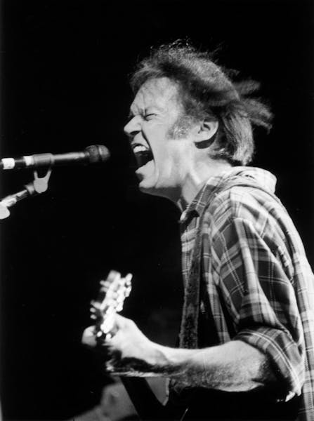 Neil Young, musician, singer, songwriter, sings at the Target Center in Minneapolis, January 22, 1991. Star Tribune staff photo by Brian Peterson.