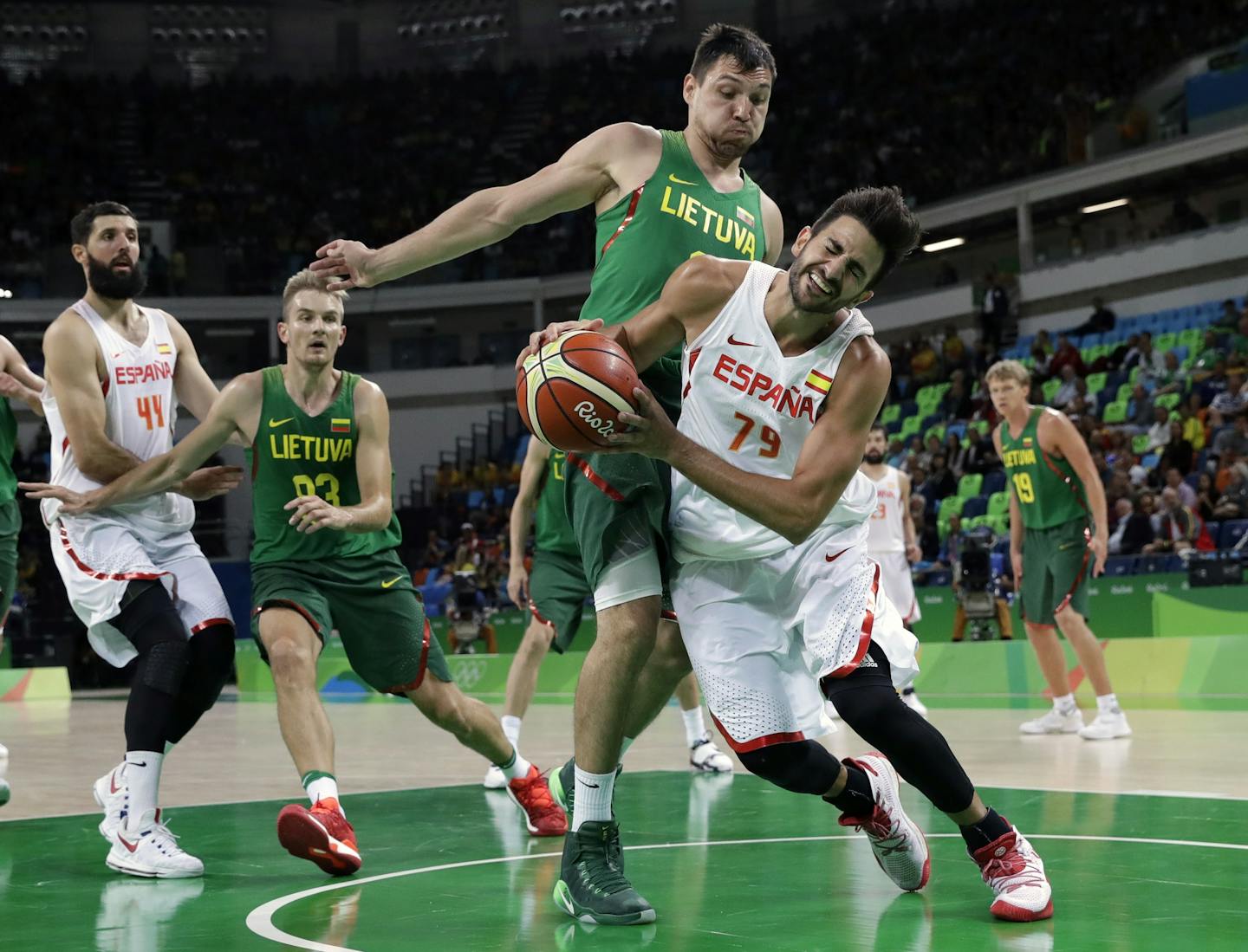 Spain's Ricky Rubio will face the U.S. in the semifinals, with assistant coach Tom Thibodeau of the Wolves looking on from the bench.