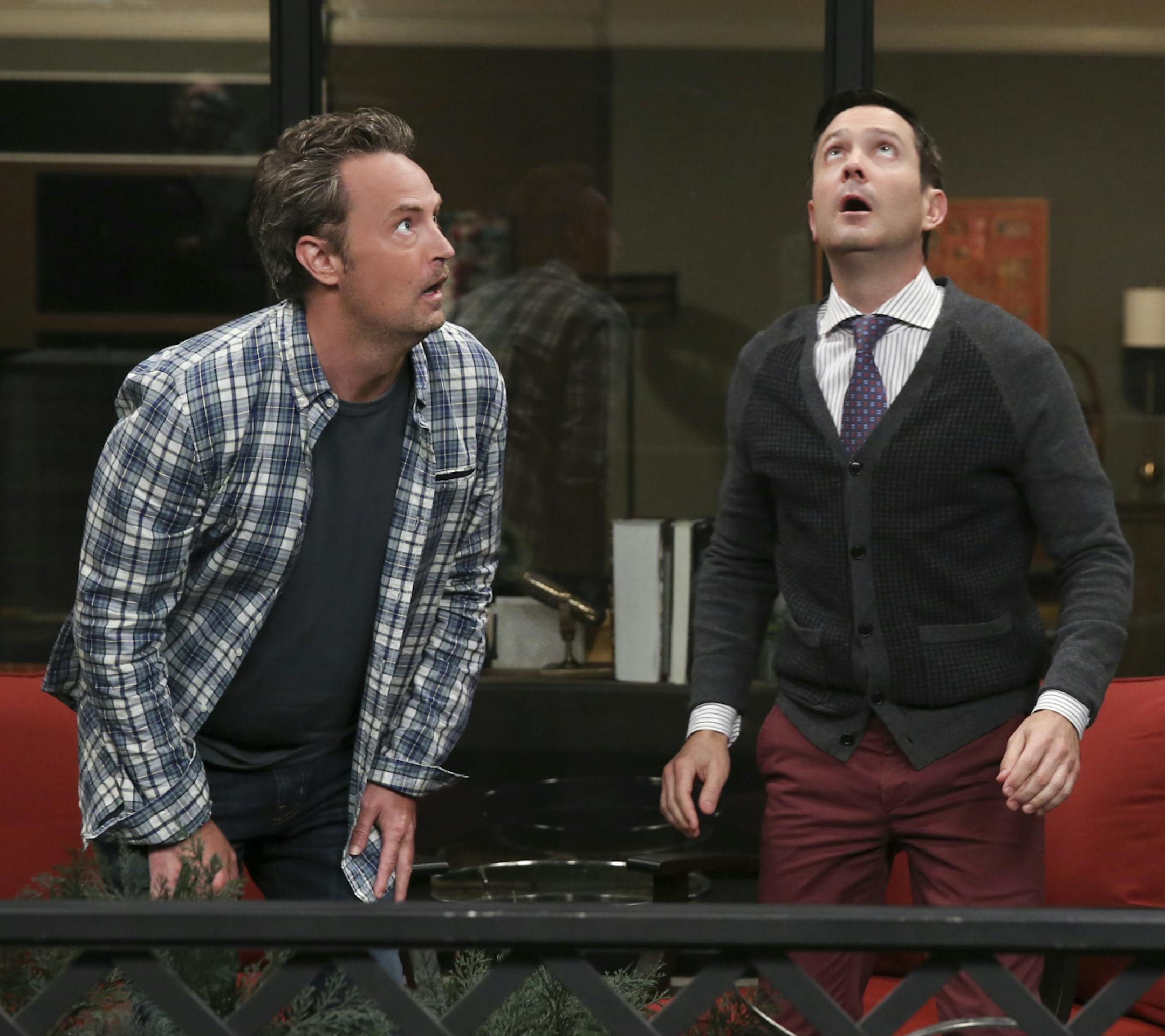 Matthew Perry, left, as Oscar Madison and Thomas Lennon as Felix Unger in the second season premiere of "The Odd Couple." Photo: Cliff Lipson/CBS