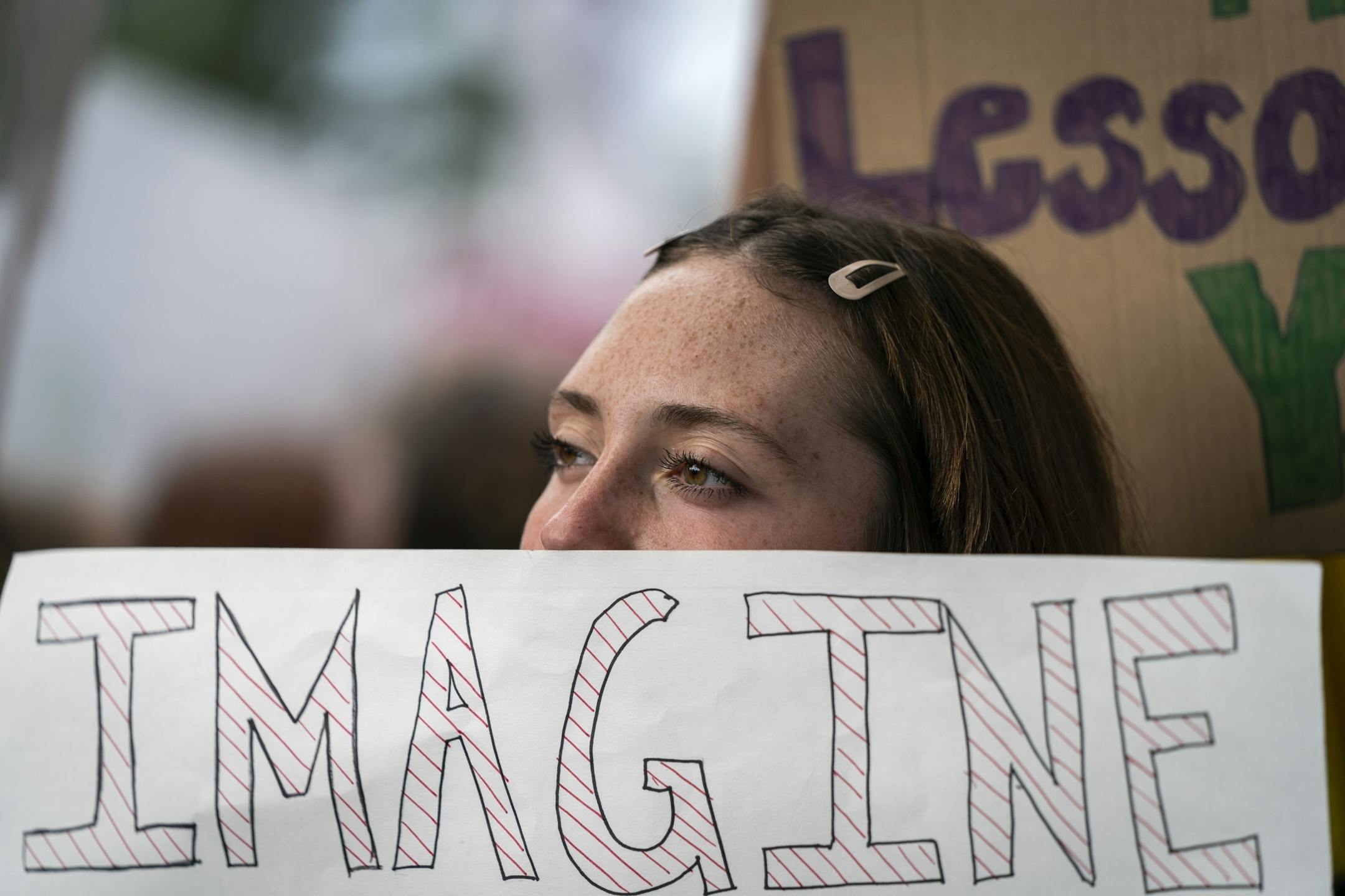Lauren Wander, 14, of Prior Lake rallied at Western Sculpture Park before the march to the Capitol.