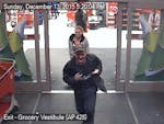 Fridley police are looking for this pair, seen running from a Target store in Fridley after a gun they had discharged.
