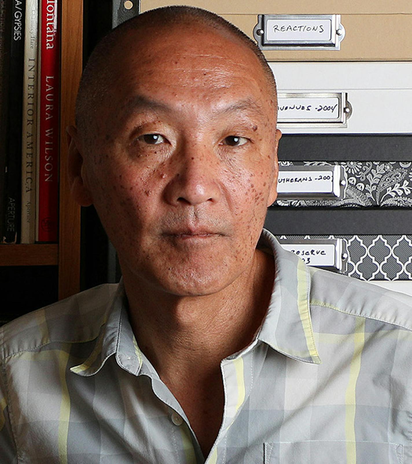 Photographer Wing Young Huie, this year's 2018 McKnight Distinguished Artist, poses for a portrait at his workspace on Aug. 11, 2018 in Minneapolis, Minn. (Anthony Souffle/Minneapolis Star Tribune/TNS) ORG XMIT: 1238666