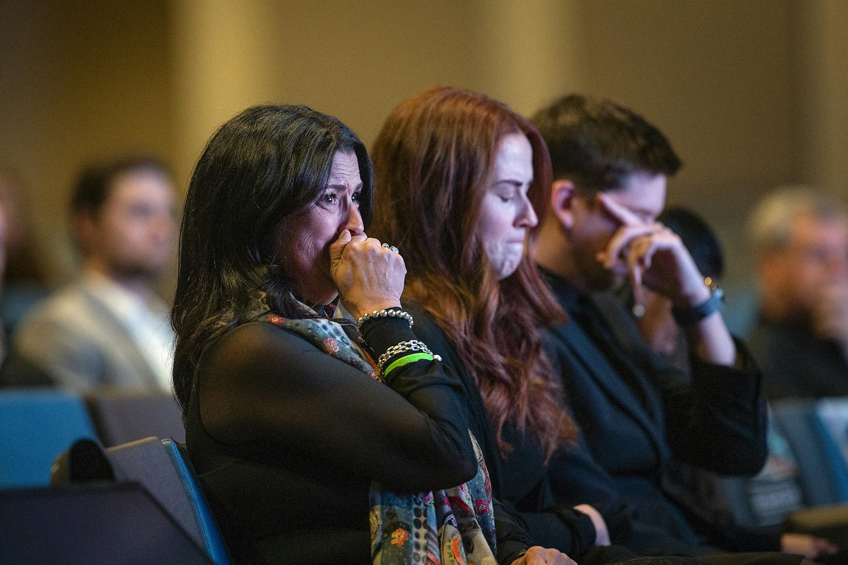 Deirdre Johnson, left, and her daughter Danika cried as they listened to Serena's father pay tribute during her memorial service in March. Serena Johnson died of a fentanyl overdose at 23.