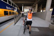 Kyle Torfin prepared to board the Northstar commuter train for his home in Elk River. Torfin recently paid $280 to have his one-of-a-kind Trek bicycle