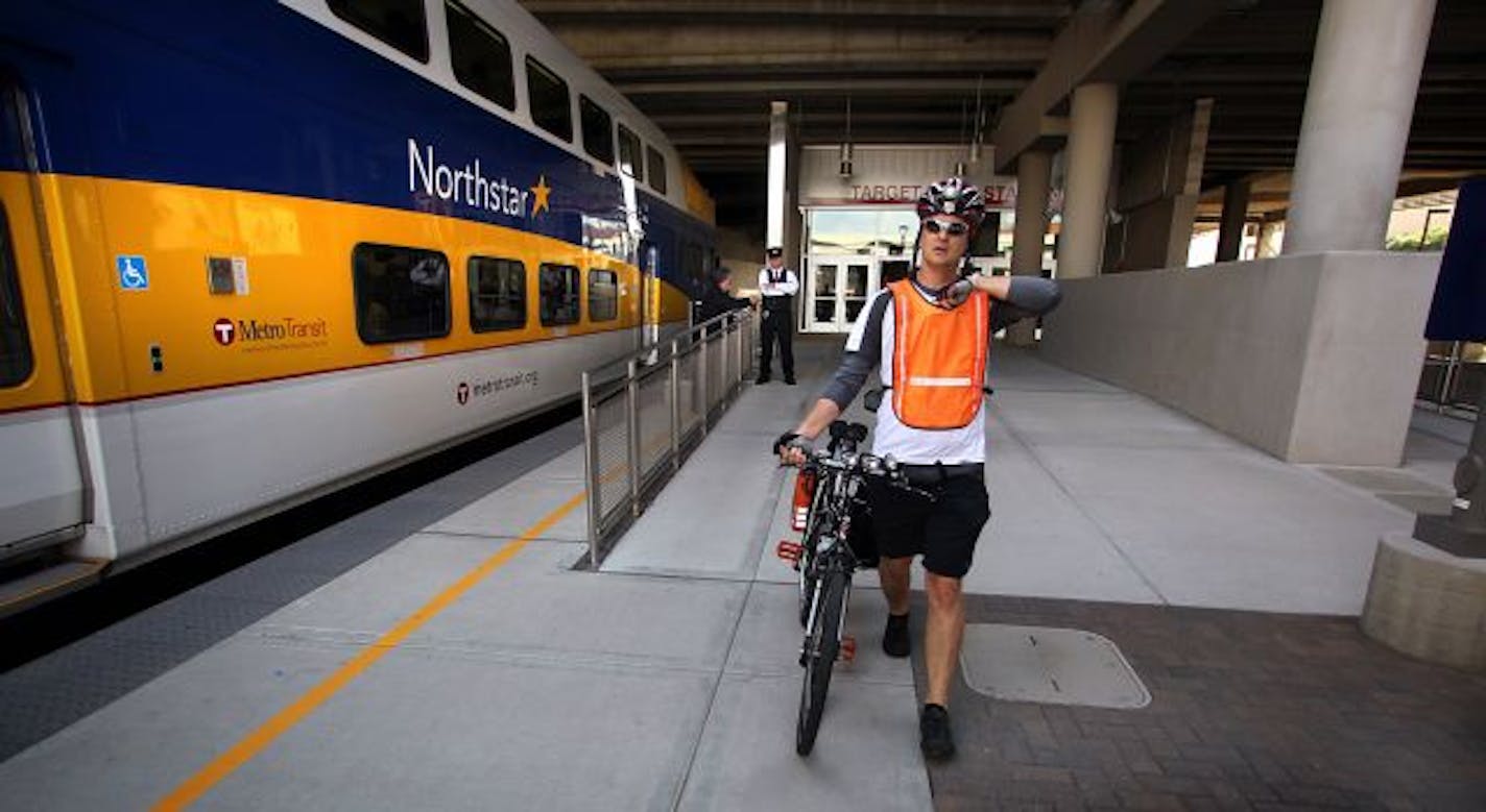 Kyle Torfin prepared to board the Northstar commuter train for his home in Elk River. Torfin recently paid $280 to have his one-of-a-kind Trek bicycle that his uncle built repainted, however the work is still not completed and the bike has not been returned. Using a bicycle he recently purchased, Torfin commutes several times a week between Elk River and Minneapolis.