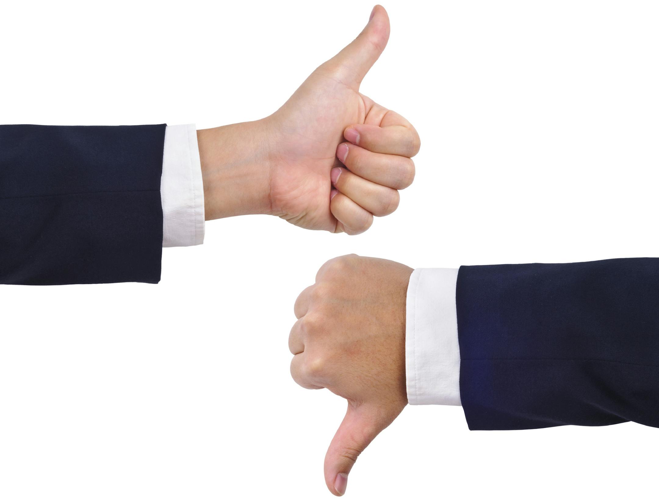 Thumb up and thumb down hand signs isolated on white