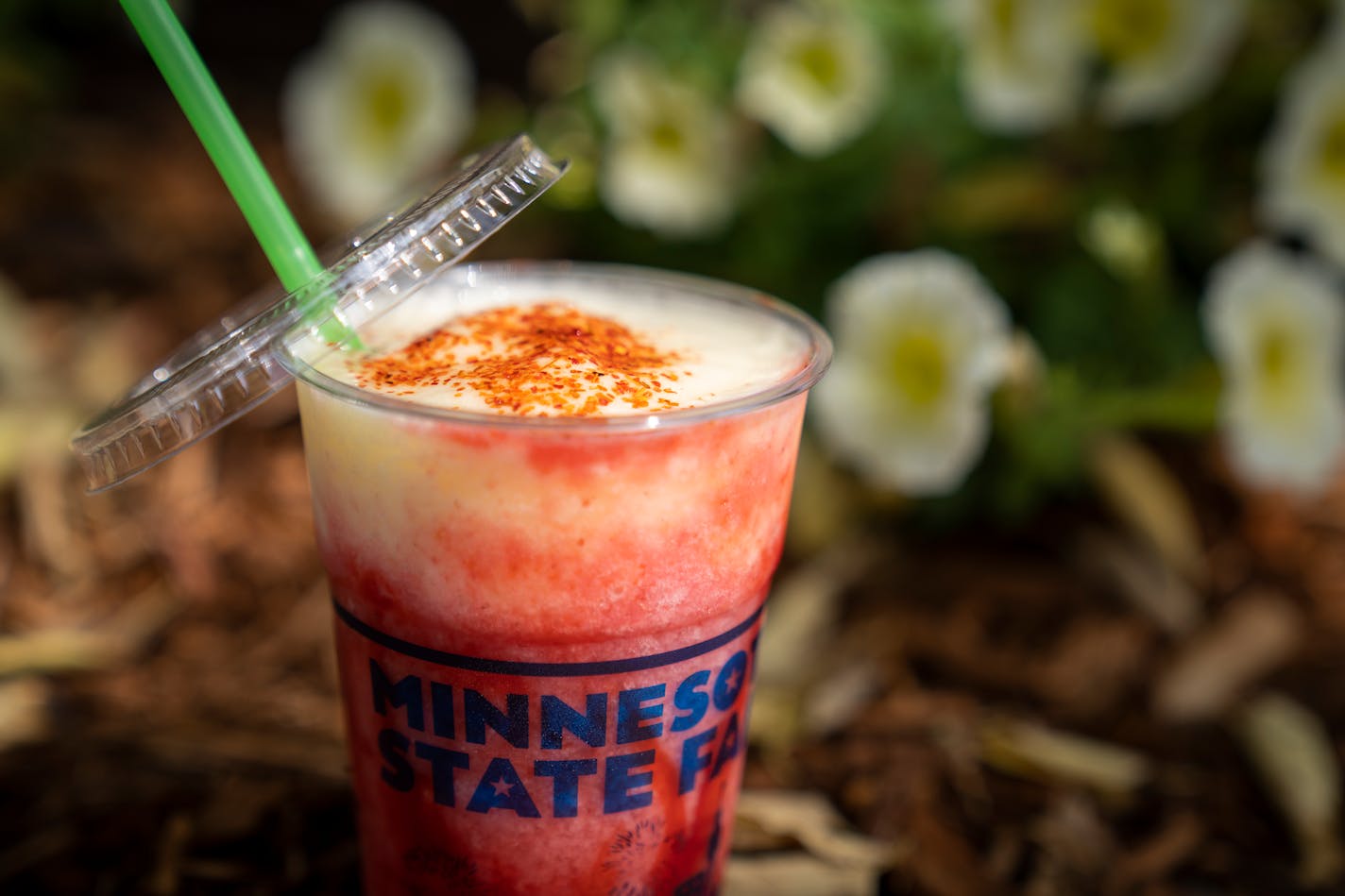 Mango Tango Tajin from Caribbean Smoothees. The new foods of the 2023 Minnesota State Fair photographed on the first day of the fair in Falcon Heights, Minn. on Tuesday, Aug. 8, 2023. ] LEILA NAVIDI • leila.navidi@startribune.com