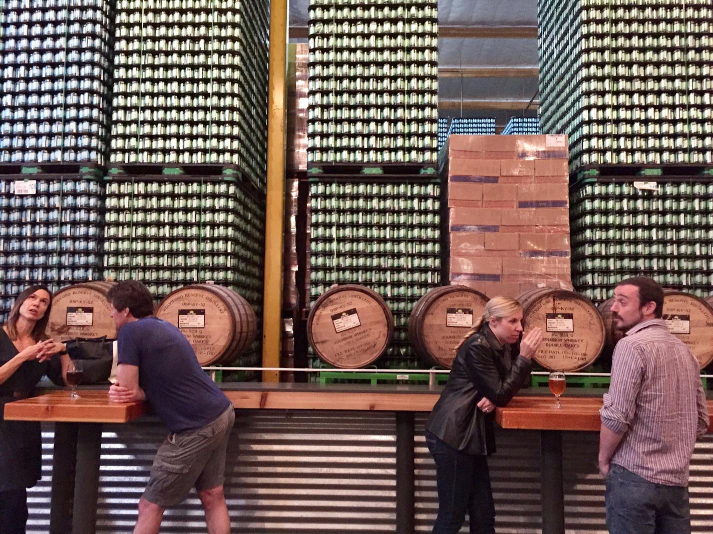 Beer drinkers gathered under heat lamps inside the Green Flash Brewing taproom in San Diego, one of a growing number of taprooms drawing locals and tourists.