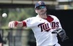 Minnesota Twins third baseman Josh Donaldson throws to first during a spring training baseball game against the Tampa Bay Rays, Friday, March 6, 2020,