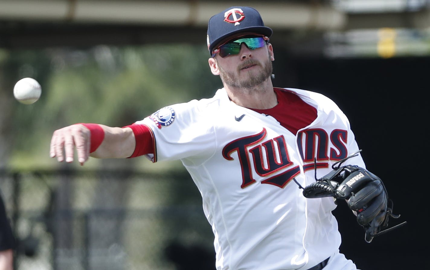 Minnesota Twins third baseman Josh Donaldson throws to first during a spring training baseball game against the Tampa Bay Rays, Friday, March 6, 2020, in Fort Myers, Fla. (AP Photo/Elise Amendola)