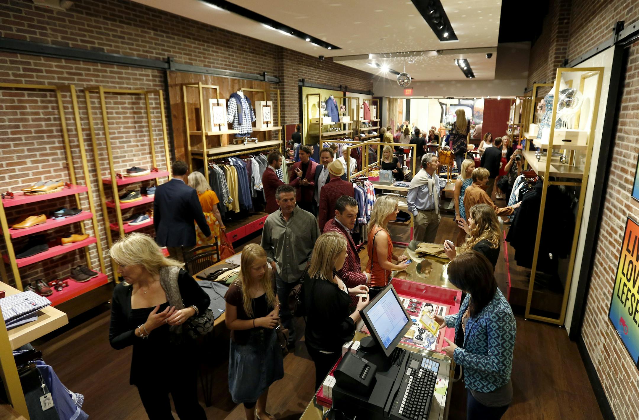 Shoppers looked through the new Moods of Norway store in the Mall of America during the grand opening on Thursday. ] CARLOS GONZALEZ cgonzalez@startribune.com September 5, 2013, Bloomington, Minn., Mall of America store opening - Moods of Norway , MOA, ribbon cutting of the new store at 6:30 p.m. and the party at Radisson Blu