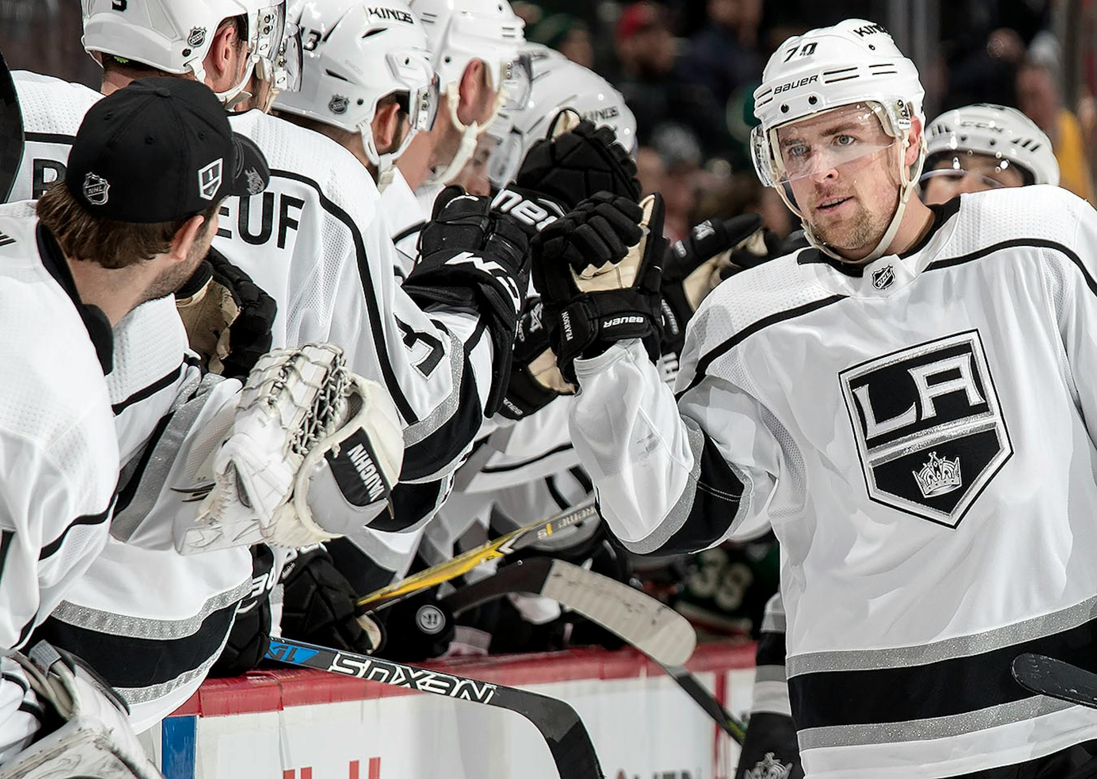 Tanner Pearson (70) celebrated with teammates after scoring a goal in the first period.