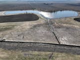 A drainage ditch project in Lyon County near Marshall, shown here in May, violated wetland and public water laws, draining part of Roggeman Marsh. Rep
