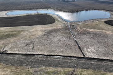 A drainage ditch project in Lyon County near Marshall, shown here in May, violated wetland and public water laws, draining part of Roggeman Marsh. Rep