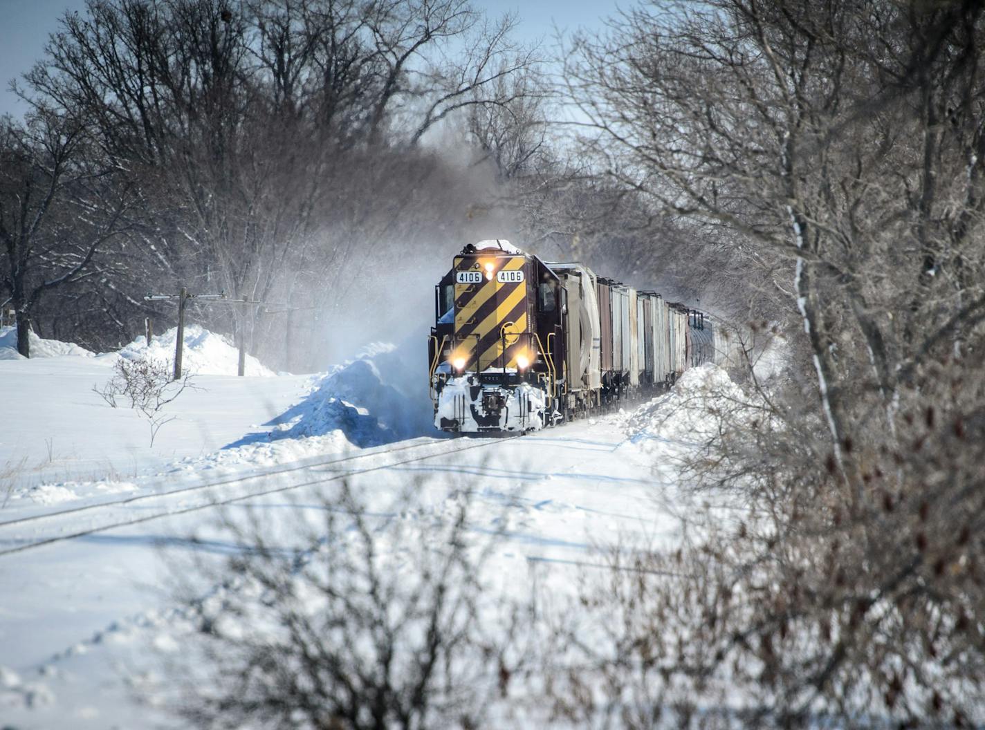 The TC&W train traveled toward Stewart, Minn., where the crew would deposit two cars loaded with fertilizer at the grain elevator there.