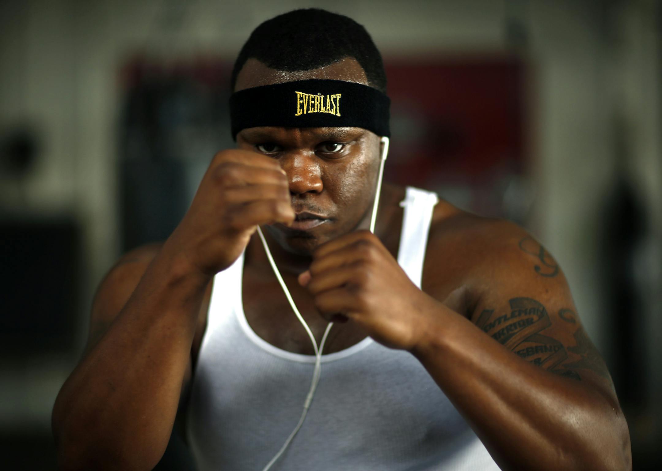 ] CARLOS GONZALEZ cgonzalez@startribune.com July 18, 2013, Minneapolis, Minn., Uppercut Boxing Gym, Feature on a local pro boxer who is trying to make ends meet at his sport. Aaron "Gorilla" Green