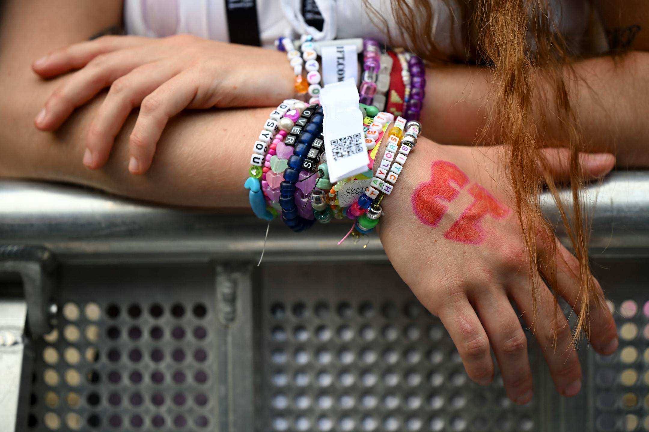A fan wears Taylor Swift friendship bracelets Friday, June 23, 2023, at US Bank Stadium in Minneapolis, Minn.