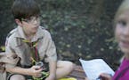 Boy Scout, John Sheridan,11, of Wayzata helped other kids find items on a scavenger hunt.