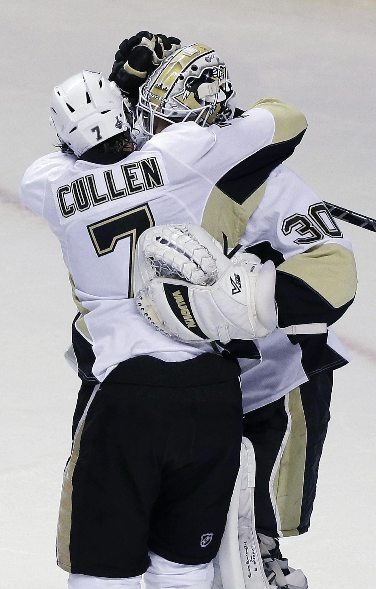 Pittsburgh Penguins goalie Matt Murray is hugged by teammate Matt Cullen at the end of Game 4 of the NHL hockey Stanley Cup Finals against the San Jose Sharks in San Jose, Calif., Monday, June 6, 2016. Pittsburgh won the game 3-1. (AP Photo/Eric Risberg)