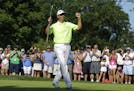 Jerry Smith celebrates after winning the Encompass Championship golf tournament Sunday, July 12, 2015, in Glenview, Ill. (AP Photo/Nam Y. Huh) ORG XMI
