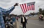 American flags are sold on the street in downtown Nairobi, Kenya, in anticipation of President Barack Obama's arrival, July 24, 2015.