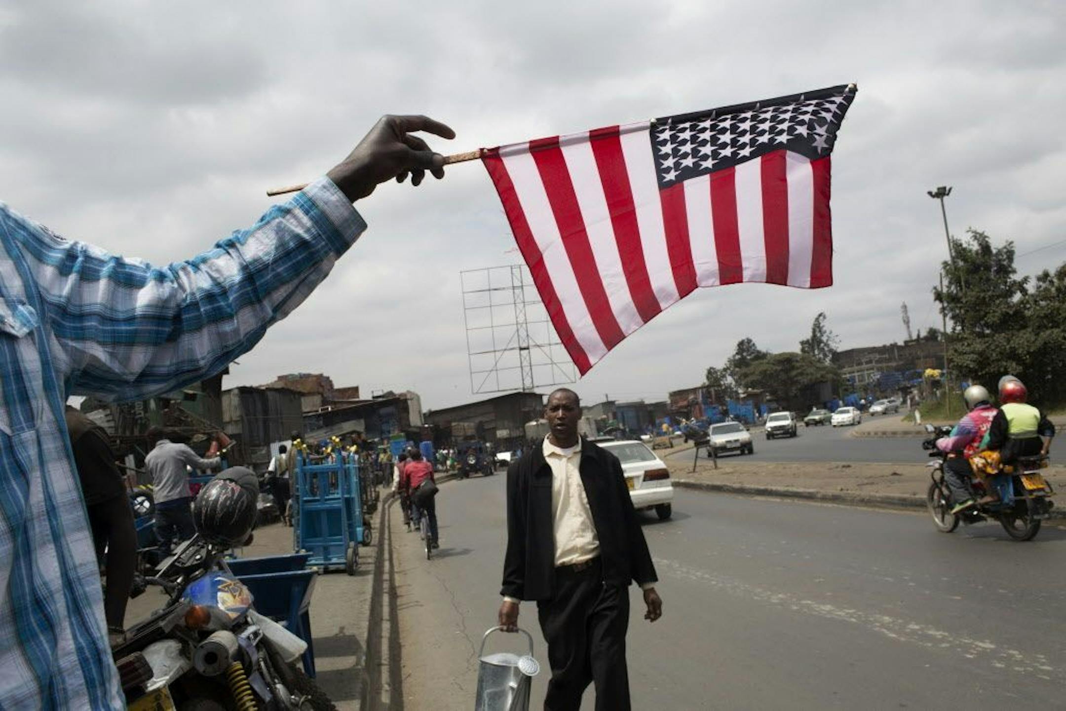 American flags are sold on the street in downtown Nairobi, Kenya, in anticipation of President Barack Obama's arrival, July 24, 2015.