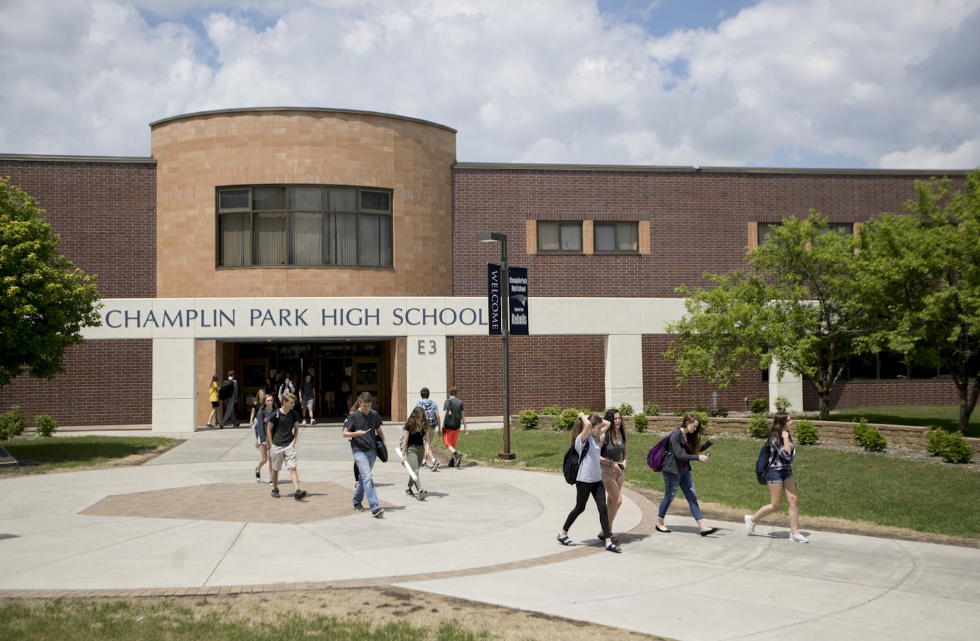 Students walked between the portable classrooms and the main school building between the bell at Champlin High School on May 31, 2018, in Champlin, Minn. Voters last fall approved the largest school referendum in Minnesota history in the Anoka-Hennepin School District, backing a $249 million plan that will makeover or add on to every single one of the district's 38 buildings that includes eliminated these portable classrooms. ] RENEE JONES SCHNEIDER ¥ renee.jones@startribune.com