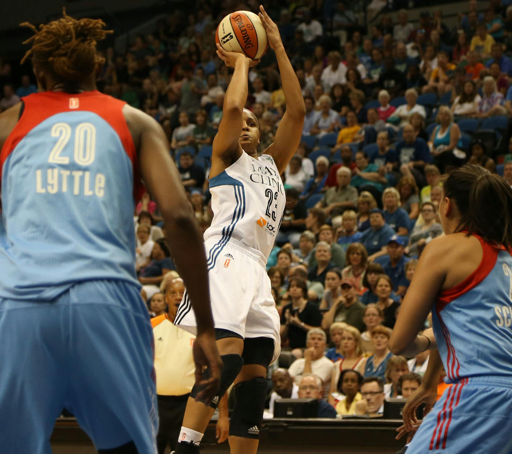 Lynx Maya Moore took her shot against Atlanta's defense during the first half. ] (KYNDELL HARKNESS/STAR TRIBUNE) kyndell.harkness@startribune.com Lynx 112, Atlanta Dream 108 at the Target Center in Minneapolis, Min. Tuesday, July 22, 2014.