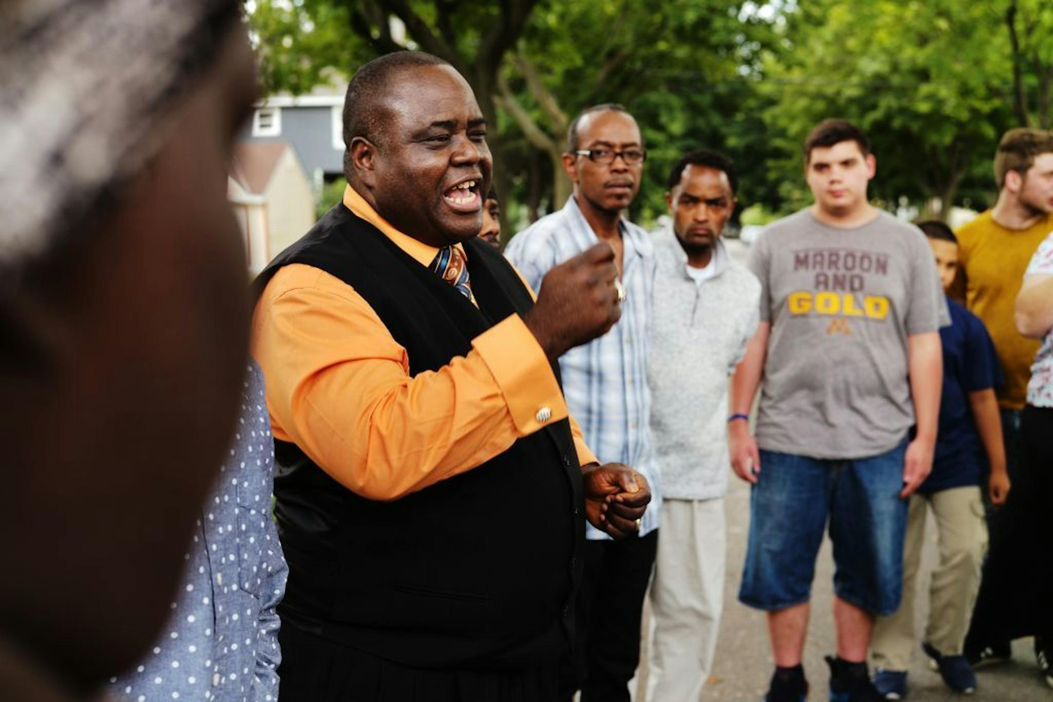 Bishop Harding Smith led a vigil for the victim of a fatal shooting on Plymouth Avenue in north Minneapolis.
